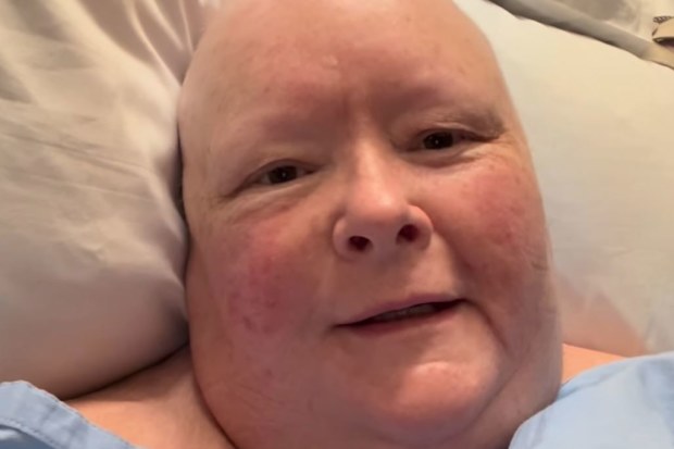 Magda Szubanski films a video message from her hospital bed.