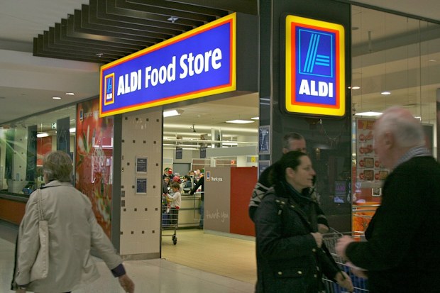 Aldi worker customers eating grapes