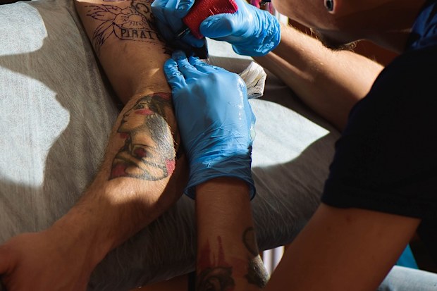 Man getting tattoo