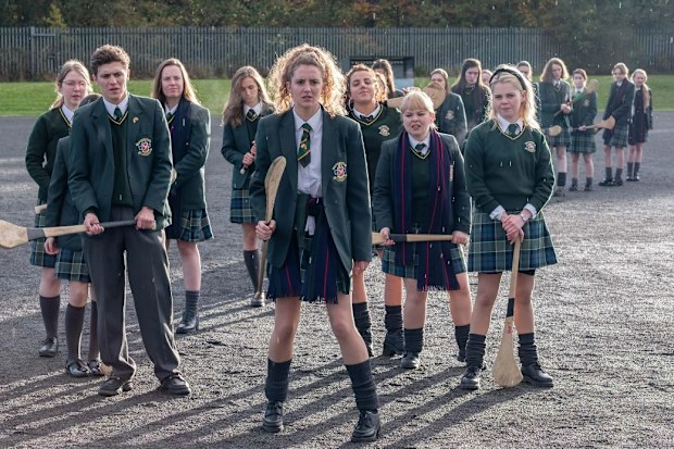 Louisa Harland as Orla McCool (centre) in comedy Derry Girls.