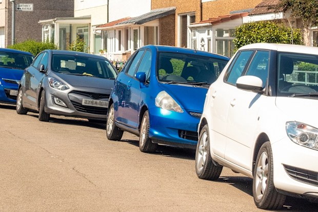 car parked in front of house