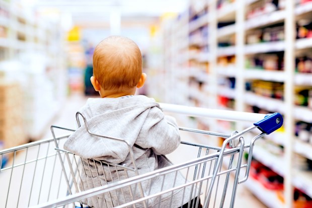Baby in a trolley at the supermarket