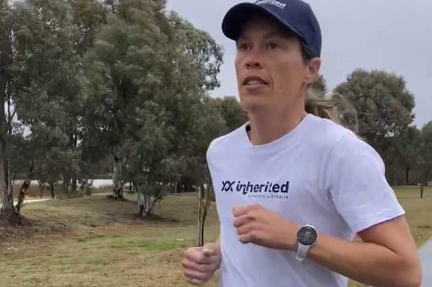 Robyn Smith will run this weekend's Voltaren City2Surf with a message painted over mastectomy scars.