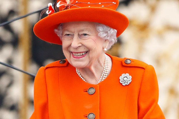 Queen Elizabeth II (Patron of the Commonwealth Games Federation), wearing her Nizam of Hyderabad diamond rose brooch, attends the launch of the Queen's Baton Relay for Birmingham 2022, the XXII Commonwealth Games at Buckingham Palace on October 7, 2021 in London, England. The Queen's Baton Relay will span 294 days, during which the Baton will visit all 72 nations and territ
