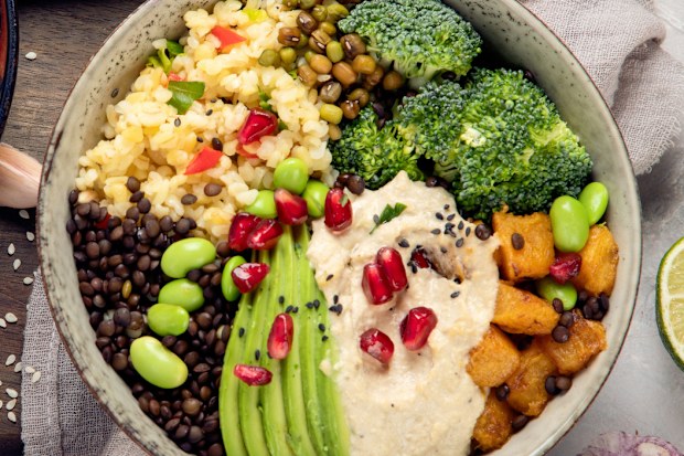 Vegan dishes assortment on light background. Mediterranean diet concept. Flat lay, top view