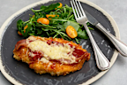 <p>This isn't your regular pub classic... can you guess where the Shapes are hidden?</p><p><strong>Ingredients﻿</strong></p><ul><li>⅓ cup plain flour</li><li>2 eggs</li><li>Arnott's Shapes Cheese and Bacon</li><li>800 gm chicken breast sliced lengthways</li><li>½ cup crushed tomatoes</li><li>1 cup grated cheddar</li><li>200 gm streaky bacon</li><li>Vegetable oil for frying</li></ul><p><strong>Method</strong></p><ol><li>﻿Heat your oven to 200°C. Line a baking tray with baking paper and set aside. Heat a medium-sized frypan and cook bacon until your liking.</li><li>In a food processor, process Arnott's Shapes until they resemble bread crumbs. Place in a medium bowl and set aside. Place eggs in a medium bowl and lightly whisk. Place flour in a medium bowl.</li><li>Lightly coat chicken, one by one, in flour, shake off any excess, then dip in the egg mix, then the Shape crumbs mixture, pressing gently.</li><li>Once all have been coated, heat oil in a medium frypan, cook chicken in batches for 2 to 3 minutes each side or until golden. Place on a lined baking tray. Spoon over crushed tomatoes, top with bacon and cheese.</li><li>Bake for 10 minutes or until cheese has melted. Serve with rocket salad.</li></ol><p><a href="https://www.arnotts.com/recipes/arnotts-shapes-cheese-and-bacon-parmigiana" title="Recipe courtesy of Arnott's" target="_blank" rel="">Recipe courtesy of Arnott's</a>.﻿</p>