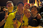 Bowen Yang and Matt Rogers with friends at Coachella