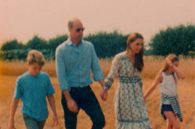 The Prince and Princess of Wales with their children in a family video