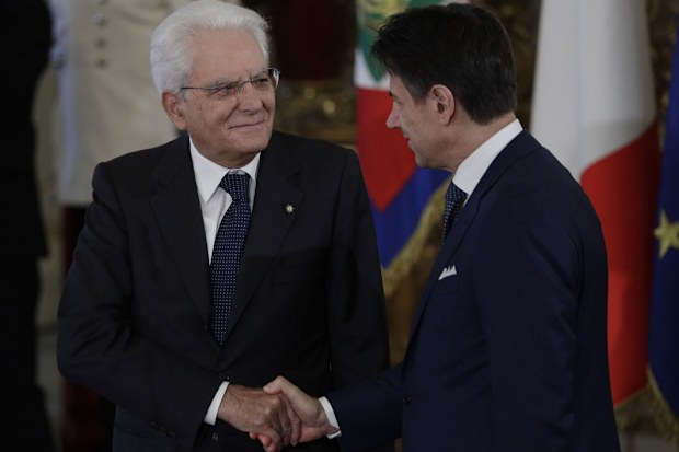Italian President Sergio Mattarella, left, shakes hands with Prime Minister Giuseppe Conte during the swearing-in ceremony at the Quirinale Presidential Palace, in Rome (Photo: September, 2019)