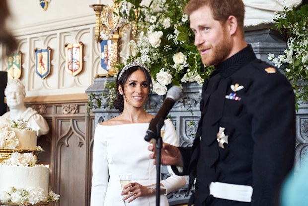 Meghan, the Duchess of Sussex, with Prince Harry, the Duke of Sussex, at their daytime wedding reception at Windsor Castle on May 19, 2018, in Windsor.