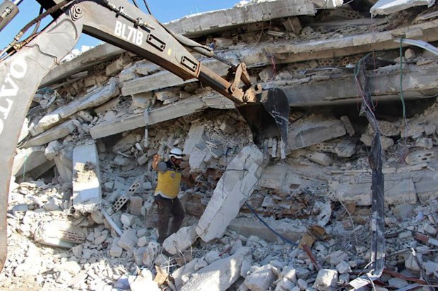The search for buried survivors continues in the rubble of the buildings.