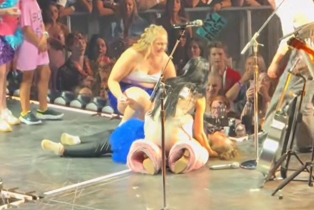 Katy Perry tends to fan onstage