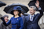 COPENHAGEN, DENMARK - JANUARY 15: Queen Mary of Denmark and King Frederik X of Denmark wave as they arrive to participate in the Danish Parliament's celebration of the succession of the throne at Danish Parliament on January 15, 2024 in Copenhagen, Denmark. King Frederik X is succeeding Queen Margrethe II, who has stepped down after reigning for 51 years. (Photo by Patrick van Katwijk/Getty Images)