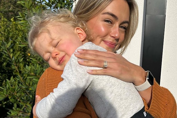 Steph Claire Smith cuddles her son Harvey.