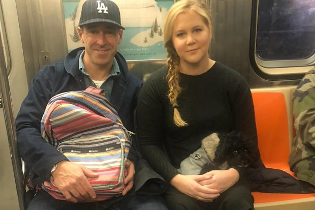 Schumer, 44, announced her split from Chris Fischer, 45, in a casually worded Instagram post, accompanied by a photo of them sitting side-by-side on the train. 