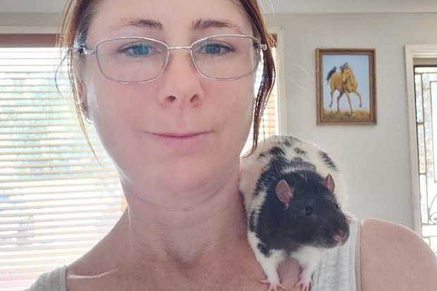 Vice President of the NSW Fancy Rat Society Rachel Sydenham with her fancy rat, Rattikins Southern Cross.