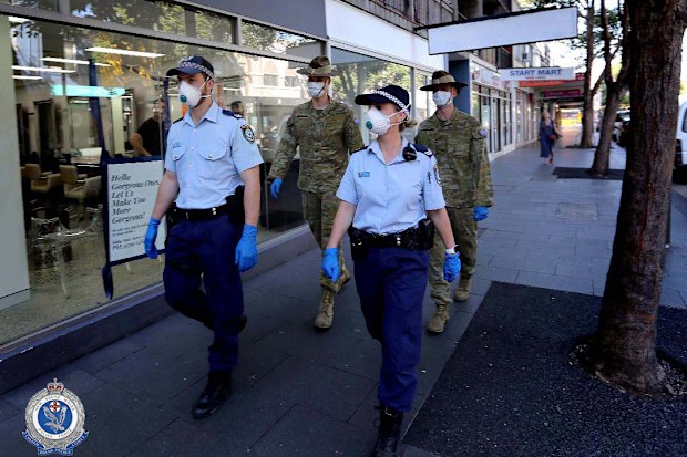 Returned overseas travellers must self-isolate at their homes.