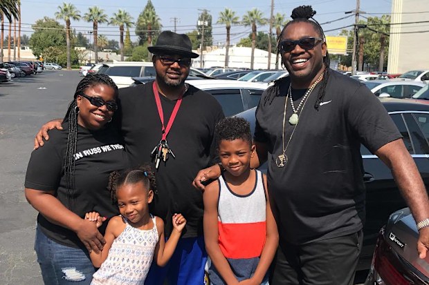 Zendaya's dad with her brother Julien and his family