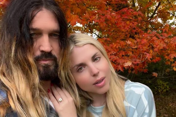 Billy Ray Cyrus and Aussie singer Firerose seemingly confirm engagement.