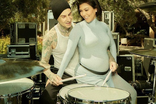 Kourtney Kardashian and Travis Barker, pictured at their gender reveal, have hinted their unborn son might be named Rocky.