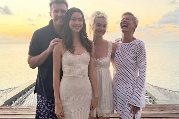The couple, who visited the Maldives 22 years ago after they tied the knot, took their daughters, Allegra and Giselle Overton, back to the luxury holiday spot