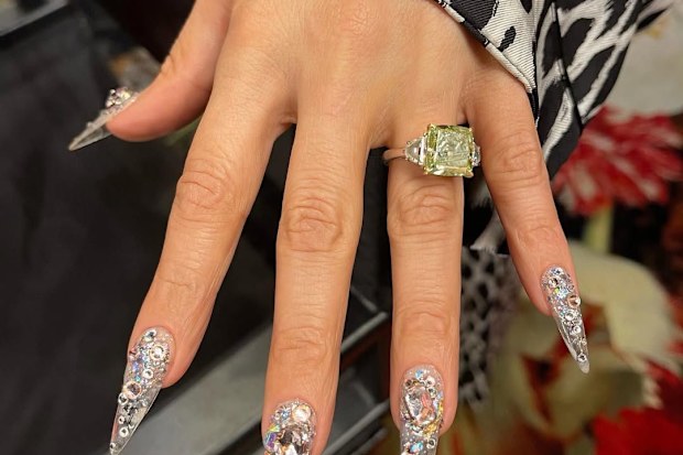 Jennifer Lopez with her engagement ring from Ben Affleck