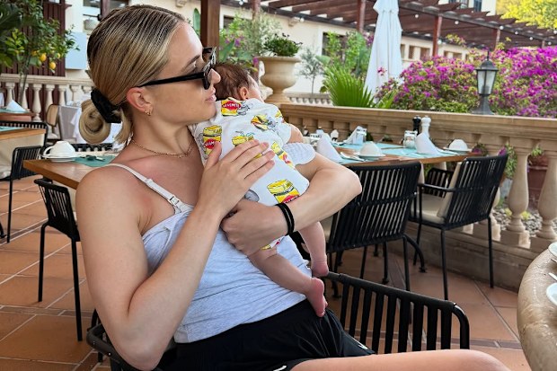 Sam Kerr and Kristie Mewis on holiday in Spain with their son Jagger