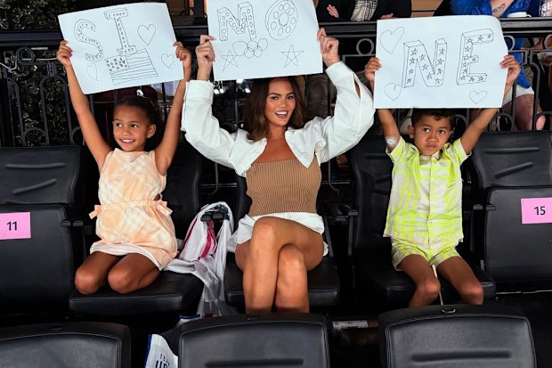 Chrissy Teigen with her son Miles and daughter Luna in Paris