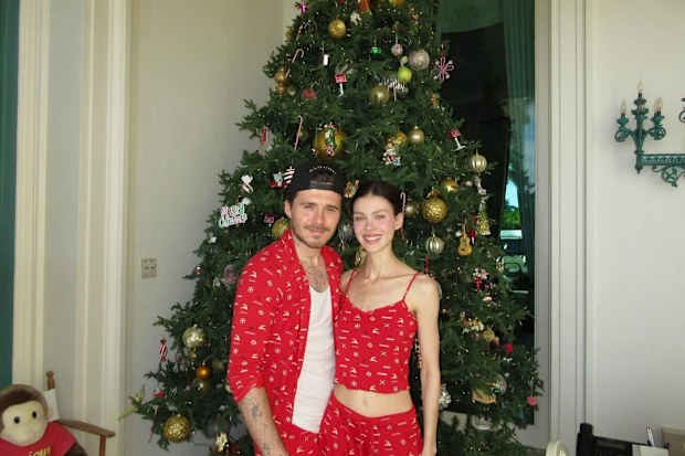 Brooklyn Beckham and his wife at Christmas 