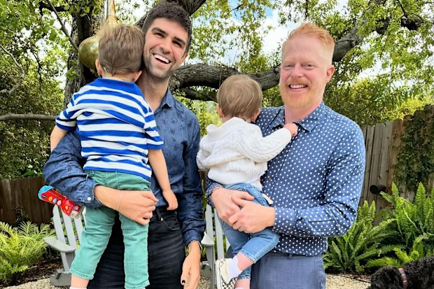 Jesse Tyler Ferguson and Justin Mikita with their two sons.