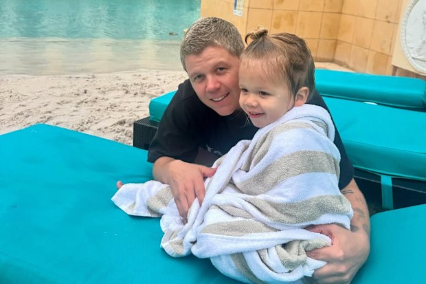 Conrad Sewell with his daughter Faith