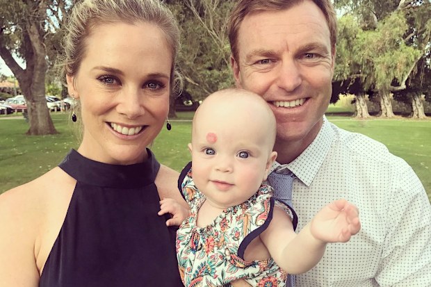 Sam Squiers with husband Ben and their eldest daughter Imogen after her NICU ordeal.
