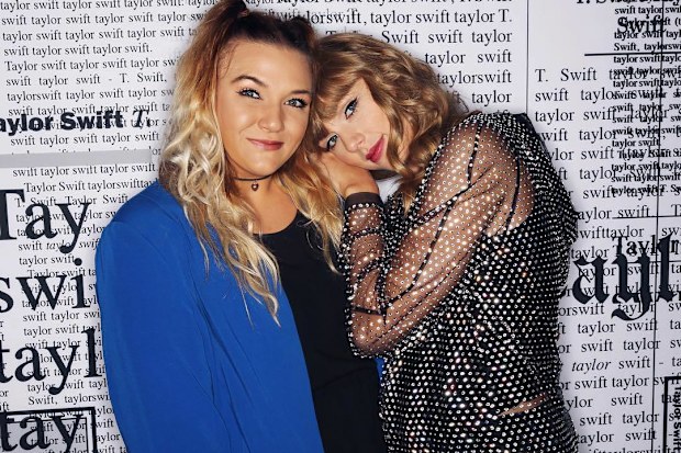 Carly Heading poses with Taylor Swift at one of her Reputation shows in 2018.