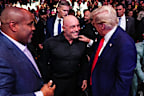 NEW YORK, NEW YORK - NOVEMBER 16: (L-R) Daniel Cormier, Joe Rogan and President-elect Donald Trump talk during the UFC 309 event at Madison Square Garden on November 16, 2024 in New York City. (Photo by Jeff Bottari/Zuffa LLC)