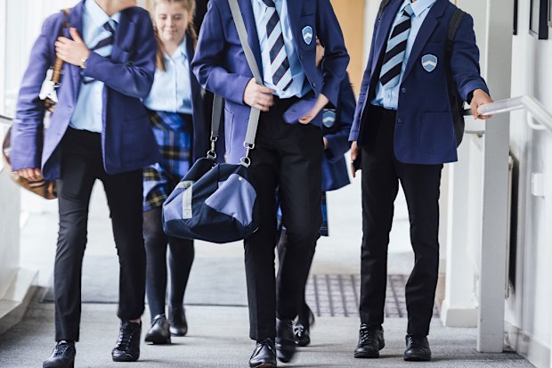 High school students walking to class