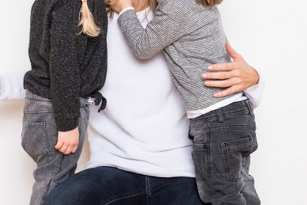 Woman holding children