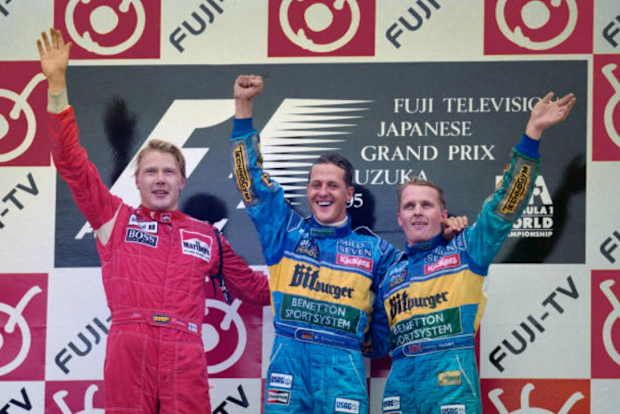 Michael Schumacher and Johnny Herbert.