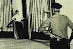 <p>Minutes later, police arrived and the spooked remaining robbers took the staff at the bank hostage.</p><p>Soon a crowd of thousands surrounded the bank, alternately booing or cheering for Wojtowicz as he negotiated with police.</p><p>And in the bank itself, the hostages formed an unusual bond with the robbers.</p><p>"I'm supposed to hate you guys, but I've had more laughs tonight than I've had in two weeks," the manager told Wojtowicz.</p>