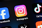 Toronto, Canada - August 22, 2024:    Popular social media apps on an Apple iPhone: Facebook, Instagram, TikTok, Threads, X (formerly Twitter), and Reddit.