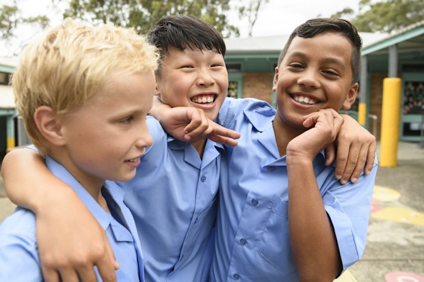 Multi ethnic children playing and having fun at break time