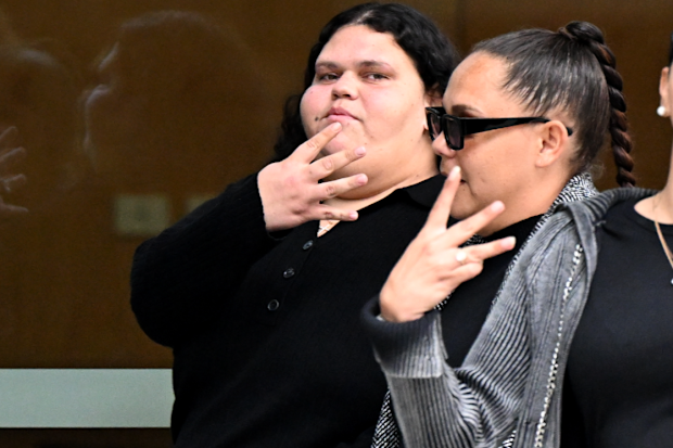 Jamie Lee Brown (left) is seen outside the Brisbane Supreme Court in Brisbane on Tuesday