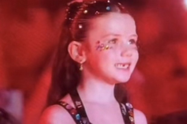 Lily was all smiles as she watched the song from the front of the stage.