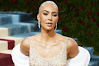 Kim Kardashian wearing Marilyn Monroe's 'Happy Birthday, Mr President' dress to the Met Gala 2022.