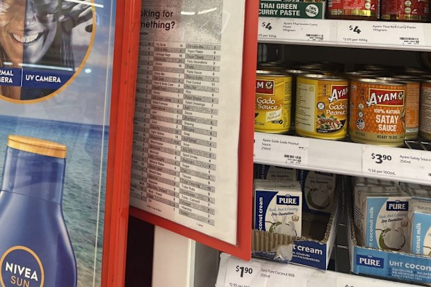 product list at top of aisle at coles woolworths supermarkets
