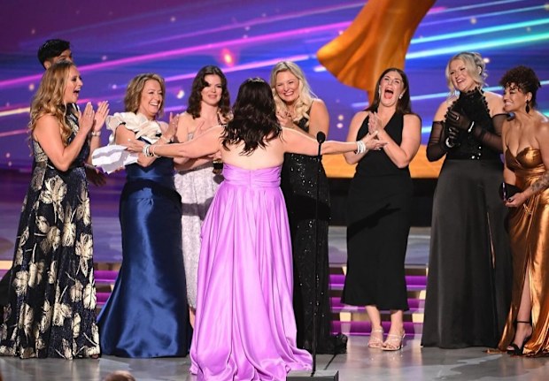 Emily Walsh (third from right) – 2024 Emmy Award winner