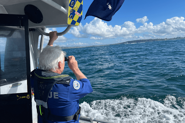 Marine Rescue NSW vessel searching for missing swimmer Newcastle