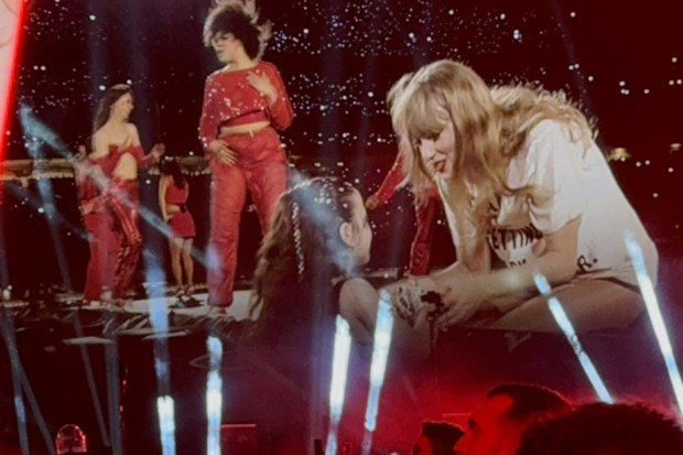Taylor Swift hugged Lily before giving her the 22 hat.