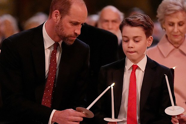 Prince William, Prince of Wales and Prince George during the 'Together At Christmas' Carol Service at Westminster Abbey on December 6, 2024 in London, England. 