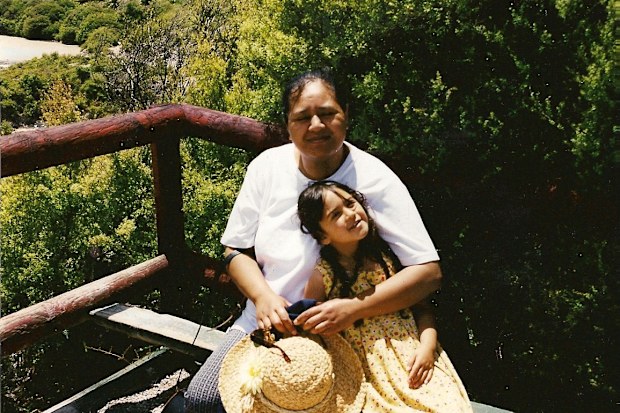 Sapphire Mitchell as a young girl with her mum.