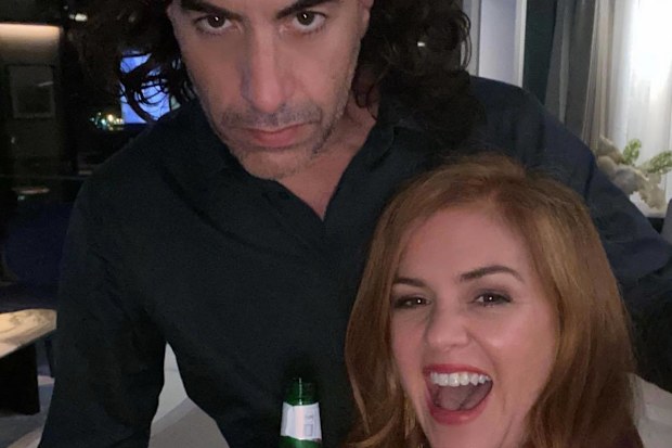 Isla Fisher and Sacha Baron Cohen dressed up for a party.